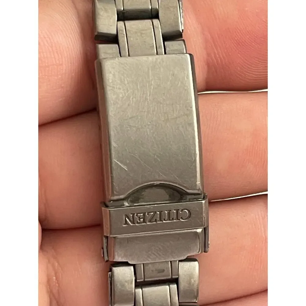 Citizen Eco-Drive Titanium WR100 Men’s Watch Two-Tone Date Gray